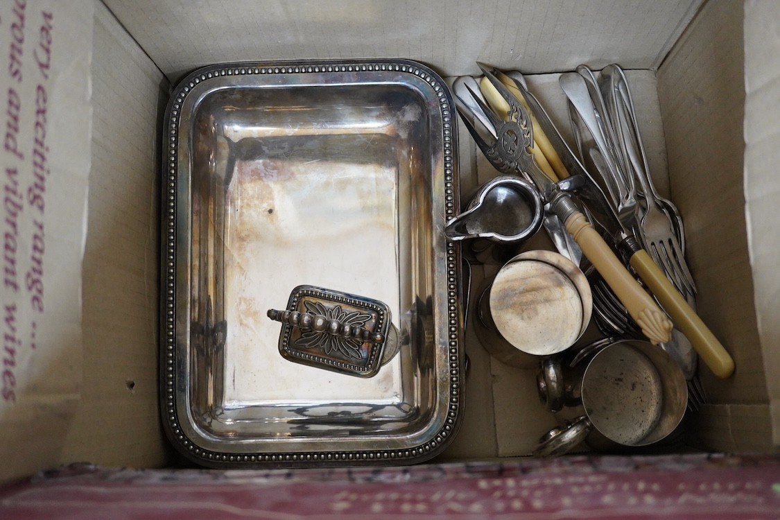 A quantity of assorted plated items including entrée dishes, flatware and mugs.